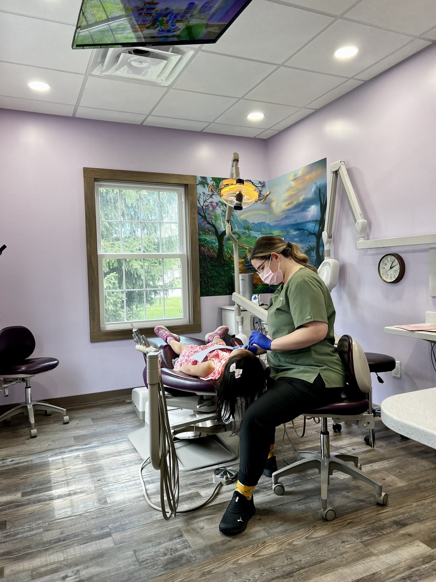 employee playing with child